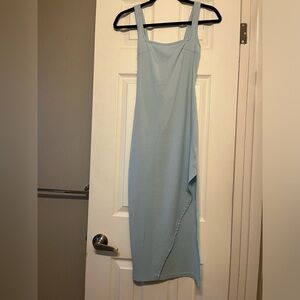 Cute light blue tight dress with slit